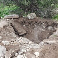 Damage to an ancient wine press at the Soger archaeological site in the Galilee region, January 29, 2023. (Reuven Kapol/Israel Antiquities Authority)