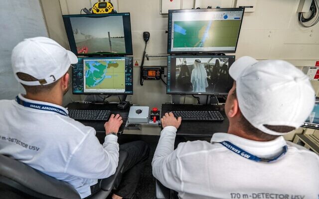 Controllers man a terminal at the command station of the Israel Aerospace Industries (IAI) during an unmanned maritime demonstration at the Naval Defence and Maritime Security Exhibition (NAVDEX), part of the wider International Defence Exhibtion (IDEX), at the Abu Dhabi International Exhibition Centre, February 20, 2023. (Ryan Lim/AFP)