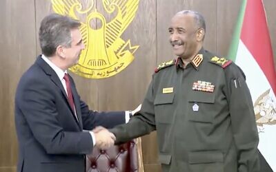 Foreign Minister Eli Cohen meets with Sudan's ruling General Abdel Fattah al-Burhan in the Sudanese capital of Khartoum on February 2, 2023. (Twitter screenshot; used in accordance with Clause 27a of the Copyright Law)