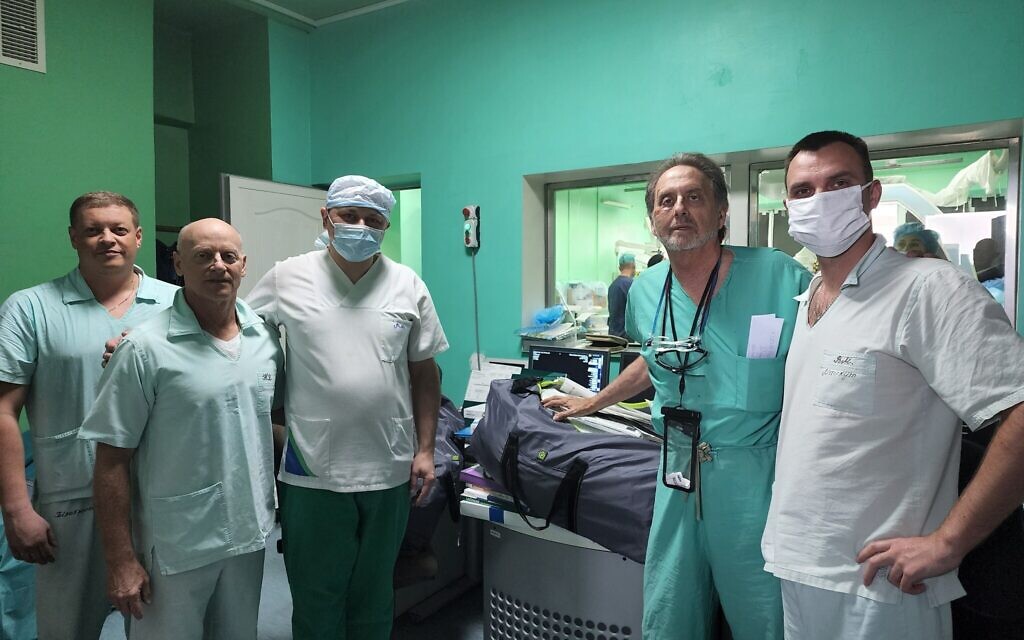Enrique Ginzburg, second from right, is shown with Ukrainian doctors in Lviv. (Courtesy of Ginzburg via JTA)