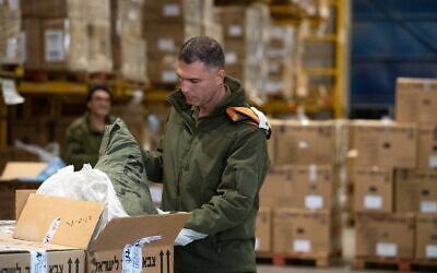 An IDF Home Front Command soldier prepares a shipment of aid and equipment for the search and rescue team departing to assist Turkey in the wake of a deadly earthquake on February 6, 2023. (Israel Defense Forces)