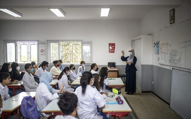 File: A teacher addresses students on the first day of the new school year in Rabat, Morocco, Friday, Oct. 1 2021 (AP Photo/Mosa'ab Elshamy)