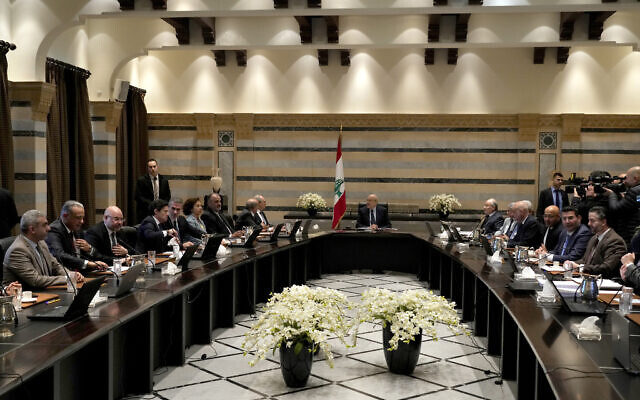 Lebanese caretaker Prime Minister Najib Mikati, center, heads a cabinet meeting in Beirut, Lebanon, January 18, 2023. (Bilal Hussein/AP)