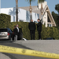 Illustrative: Police investigators stand near the site of a shooting in an upscale Los Angeles neighborhood on Jan. 28, 2023. (AP Photo/Richard Vogel)