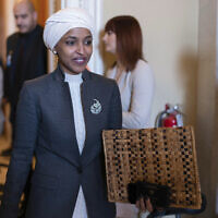 Rep. Ilhan Omar, D-Minn., leaves the House chamber at the Capitol in Washington, Thursday, February 2, 2023. (AP Photo/Jose Luis Magana)