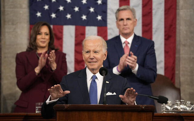 US President Joe Biden delivers the State of the Union address to a joint session of Congress at the U.S. Capitol, Tuesday, Feb. 7, 2023, in Washington, as Vice President Kamala Harris and House Speaker Kevin McCarthy of Calif., applaud. (AP/Jacquelyn Martin, Pool)