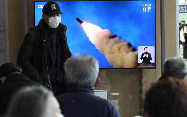 A TV screen shows a file image of North Korea's missile launch during a news program at the Seoul Railway Station in Seoul, South Korea, Monday, Feb. 20, 2023. (AP/Ahn Young-joon)