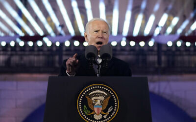 US President Joe Biden delivers a speech marking the one-year anniversary of the Russian invasion of Ukraine, at the Royal Castle Gardens in Warsaw, February 21, 2023. (Evan Vucci/AP)