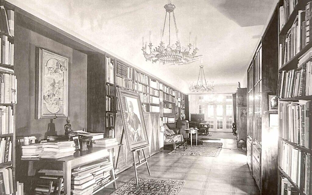 An undated photo of Curt Glaser's library in his apartment with a Tiepolo on the wall and a portrait of Glaser by Max Beckmann on the easel. (Courtesy of Sotheby's)
