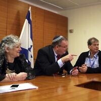 File: Then-science minister Daniel Hershkowitz (center) in a meeting in July 2012 with Israeli Nobel laureates Ada Yonath (left) and Aaron Ciechanover (Gil Yohanan/Flash90)