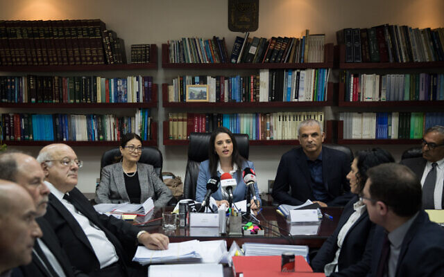 The Judicial Selection Committee during the 34th government of Israel convenes, with then-justice minister Ayelet Shaked together with then-Supreme Court president Miriam Naor, then-finance minister Moshe Kahlon and other members of the Israeli Judicial Selection Committee, February 22, 2018. (Hadas Parush/Flash 90)
