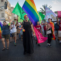 Members of the LGBT community and supporters participate in a protest march in support of the transgender community, in Tel Aviv on July 22, 2018. (Miriam Alster/Flash90)