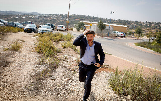Chairman of the Religious Zionism party MK Bezalel Smotrich and party members visit Netiv Haavot neighborhood in Gush Etzion, West Bank, on October 26, 2022. (Gershon Elinson/Flash90)