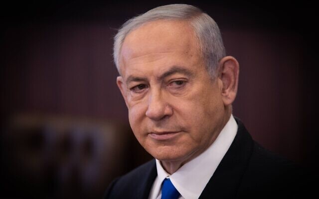 Prime Minister Benjamin Netanyahu leads a cabinet meeting in Jerusalem on February 5, 2023 (Alex Kolomoisky/POOL)
