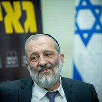 Shas chief Aryeh Deri leads a Knesset faction meeting on February 6, 2023. (Yonatan Sindel/Flash90)