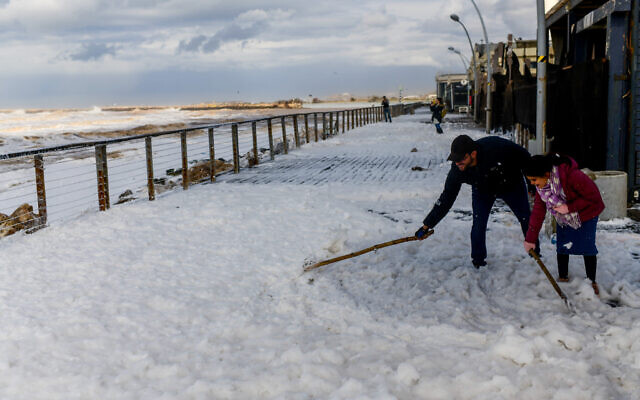 White soapy foam at the Tel Aviv port, during a stormy weather, on February 7, 2023. (Tomer Neuberg/Flash90)