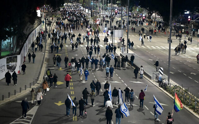 Thousands of Israelis protest against the government's planned legal overhaul, in Tel Aviv, on February 11, 2023. (Avshalom Sassoni/Flash90)