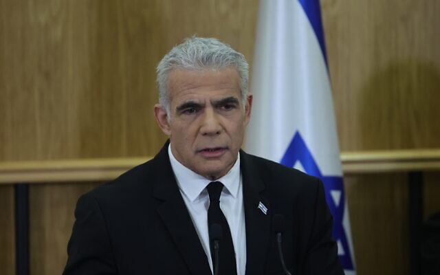 Opposition Leader Yair Lapid speaks at a joint press conference with other opposition leaders in the Knesset on February 13, 2023. (Yonatan Sindel/FLASH90)