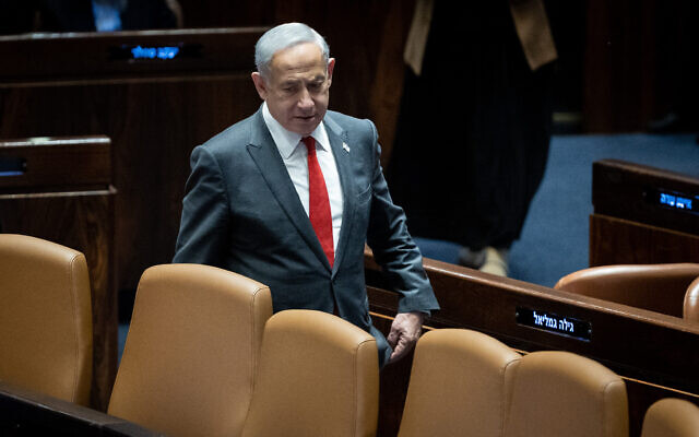 Prime Minister Benjamin Netanyahu arrives to a vote in the Knesset on February 15, 2023 (Courtesy Yonatan Sindel/Flash90)