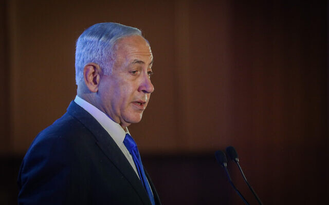 Prime Minister Benjamin Netanyahu speaks at the Conference of Presidents of Major American Jewish Organizations in Jerusalem, on February 19, 2023. (Noam Revkin Fenton/Flash90)