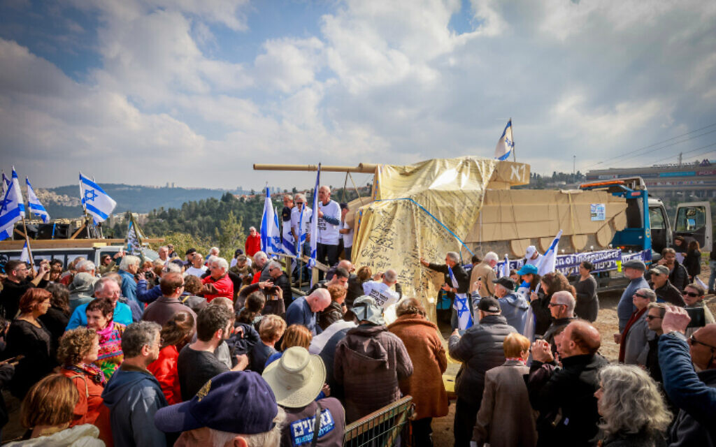 Veterans of the Yom Kippur War and others protest against the government's judicial overhaul plans, in Mevaseret Zion, near Jerusalem, February 25, 2023. (Yossi Zamir/Flash90)