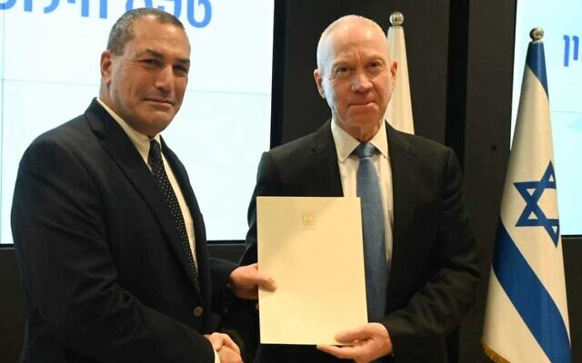 Newly appointed Defense Ministry Director-General Eyal Zamir (left) with Defense Minister Yoav Gallant in Tel Aviv, on February 1, 2023. (Ariel Hermoni/ Defense Ministry)