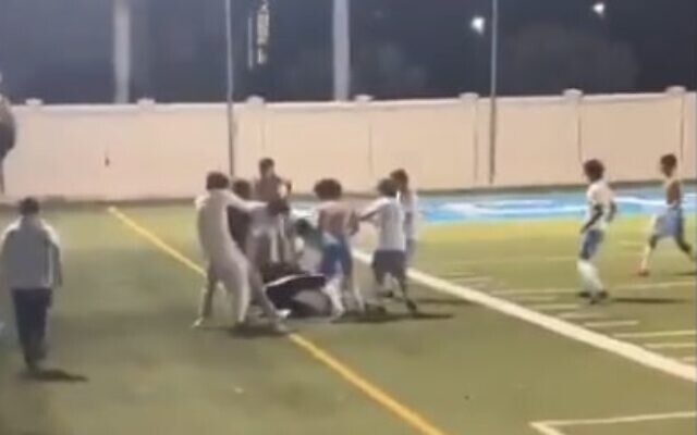 A brawl breaks out between Archbishop Coleman Carroll High School and Scheck Hillel Community School soccer teams during a match on February 15, 2023. (Screen capture/Twitter)