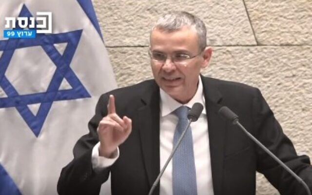Justice Minister Yariv Levin addresses the Knesset, February 20, 2023. (Yonatan Sindel/Flash90)