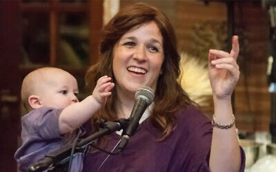 Henya Federman, co-director of Chabad St. Thomas, and her baby. (Courtesy/Chabad.org)