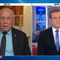 Former Bank of Israel chief Jacob Frenkel, left, during a Channel 12 interview of February 22, 2023. (Screenshot: Channel 12; Used in accordance with Clause 27a of the Copyright Law)