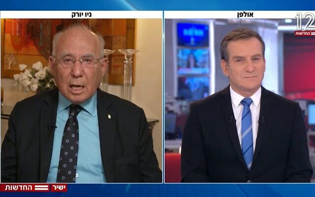 Former Bank of Israel chief Jacob Frenkel, left, during a Channel 12 interview of February 22, 2023. (Screenshot: Channel 12; Used in accordance with Clause 27a of the Copyright Law)