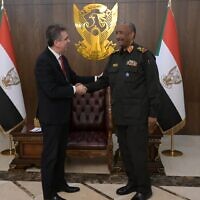 Foreign Minister Eli Cohen (left) meets with Sudanese ruler Gen. Abdel Fattah al-Burhan in Khartoum on February 2, 2023. (Shlomi Amsallem)