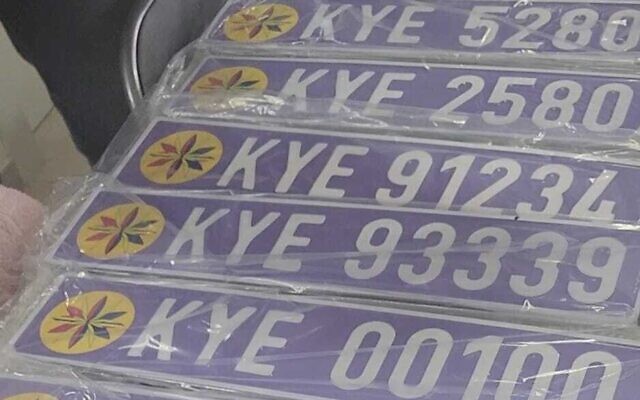 License plates found by police in the apartment of Shay Karamosta, the self-declared king of Yashar-El, Hadera, northern Israel, February 6, 2023. (Israel Police)