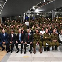 Israeli officials, including Prime Minister Benjamin Netanyah, Defense Minister Yoav Gallant, and IDF chief Herzi Halevi, are seen with the IDF search and rescue delegation to Turkey, upon their return to Israel on February 13, 2023. (Haim Zach/GPO)