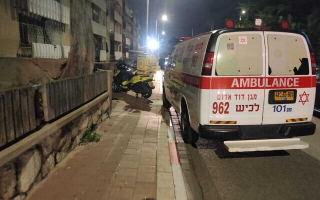 A handout photo shows emergency vehicles at the scene of a suspected murder of a woman in Ashdod, February 21, 2023. (Magen David Adom)