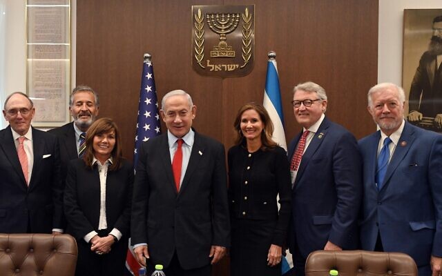 Prime Minister Benjamin Netanyahu (center) meets with US lawmakers in his office in Jerusalem on February 22, 2023. (Haim Zach/GPO)