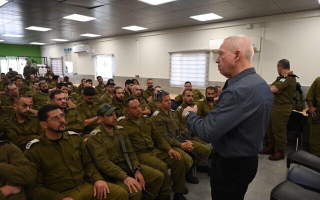 Defense Minister Yoav Gallant speaks to troops of the reservist 363rd battalion at an army base in the West Bank, February 28, 2023. (Nicole Laskavi/Defense Ministry)