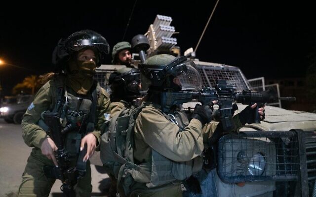 Soldiers of the Lions of the Valley battalion operate near in the Aqabat Jabr refugee camp, adjacent to Jericho, early February 6, 2023. (Israel Defense Forces)