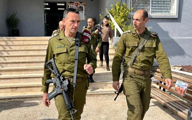 IDF chief Lt. Gen. Herzi Halevi walks alongside Col. Meir Biderman, the commander of the 417th territorial brigade at the brigade's base in the northern Jordan Valley, February 28, 2023. (Israel Defense Forces)