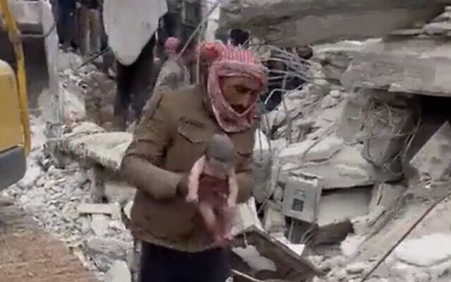 Screen capture from video of a newborn baby who was rescued from rubble following an earthquake in Syria, February 7, 2023. (Twitter. Used in accordance with Clause 27a of the Copyright Law)