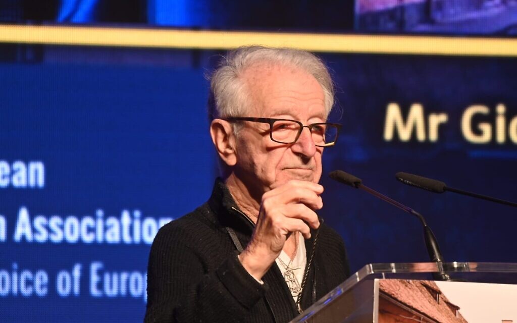 Holocaust survivor and TikTok influencer Gidon Lev speaks at a European Jewish Association symposium in Prague, January 2023. (Courtesy)