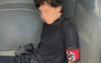A teenage boy arrested for trying to attack a school in Brazil while wearing a Nazi armband on February 13, 2023 (Monte Mor city)