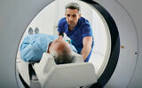 Illustrative image: a man going in to a CT scanner to check for cancer (peakSTOCK vis iStock by Getty Images)