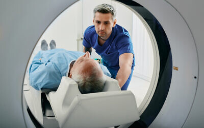 Illustrative image of a person undergoing a CT scan. (peakSTOCK via iStock by Getty Images)