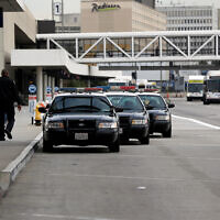 Illustrative: Police at Los Angeles International Airport, January 21, 2014. (AP Photo/Reed Saxon)