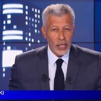 A screenshot from a BFMTV newscast in August 2022 featuring anchor Rachid M'Barki. (Screenshot via YouTube; used in accordance with Clause 27a of the Copyright Law)