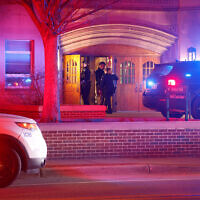Police investigate the scene of a shooting at Berkey Hall on the campus of Michigan State University, in East Lansing, Michigan, February 13, 2023. (AP Photo/Al Goldis)
