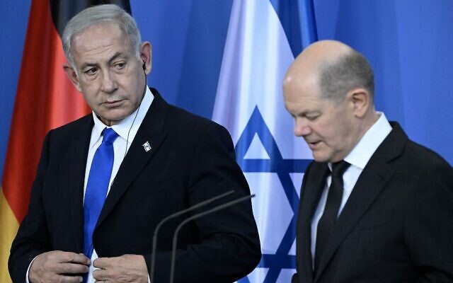 German Chancellor Olaf Scholz (R) and Prime Minister Benjamin Netanyahu speak during a joint press conference following talks at the Chancellery in Berlin on March 16, 2023. (Tobias Schwarz/AFP)
