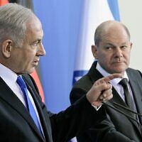 German Chancellor Olaf Scholz (R) and Prime Minister Benjamin Netanyahu speak during a joint press conference following talks at the Chancellery in Berlin on March 16, 2023. (Tobias Schwarz/AFP))