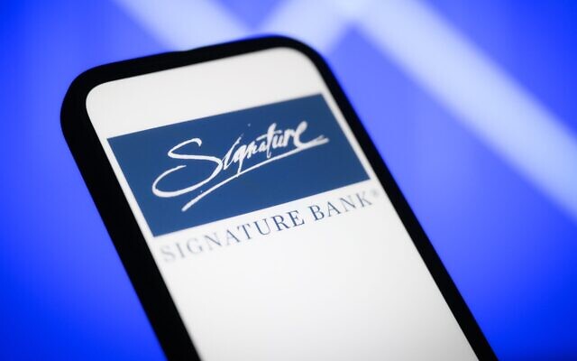 The Signature bank logo is seen in this photo illustration, March 13, 2023. (Photo by Jaap Arriens/NurPhoto via JTA)